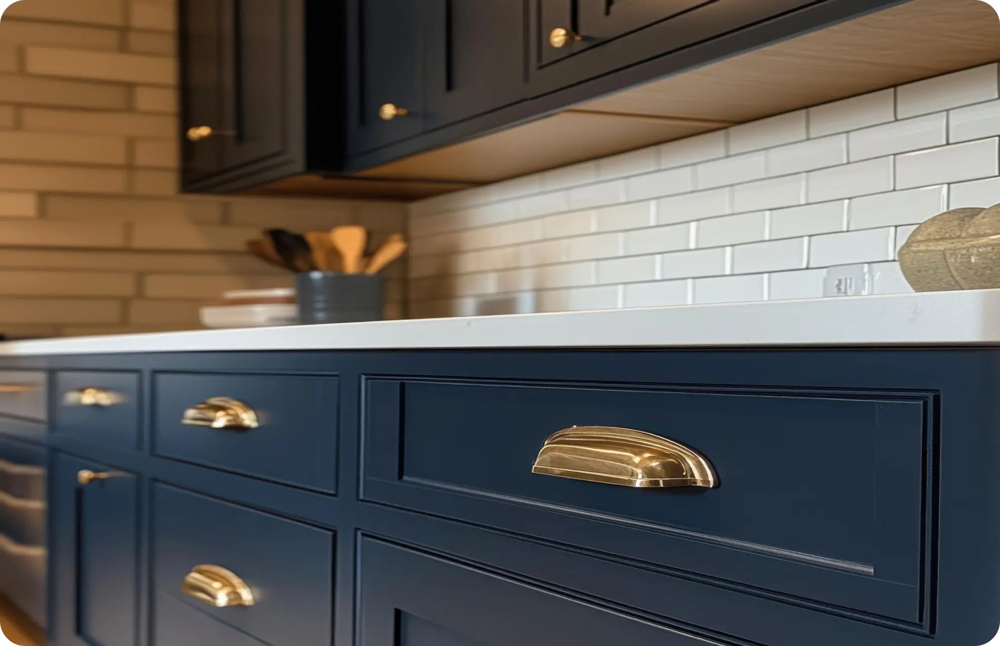 kitchen-with-dark-blue-cabinets-brass-knobs_853677-178132 1